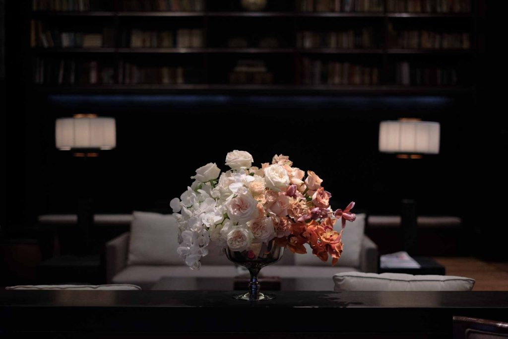 A classic and romantic Roses and orchid Flower arrangement centerpiece beige bouquet for Burberry